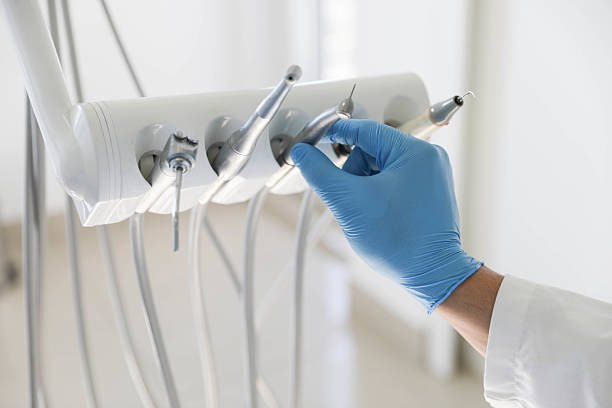 Professional Tooth Extraction technician working in Folsom, PA